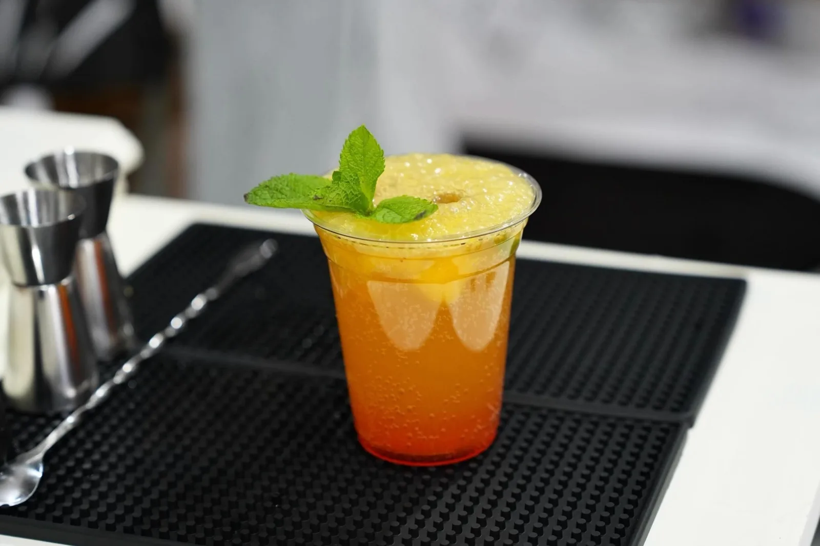 A mango mocktail with fresh mint at the cart