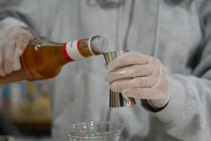 Syrup measured for a mocktail